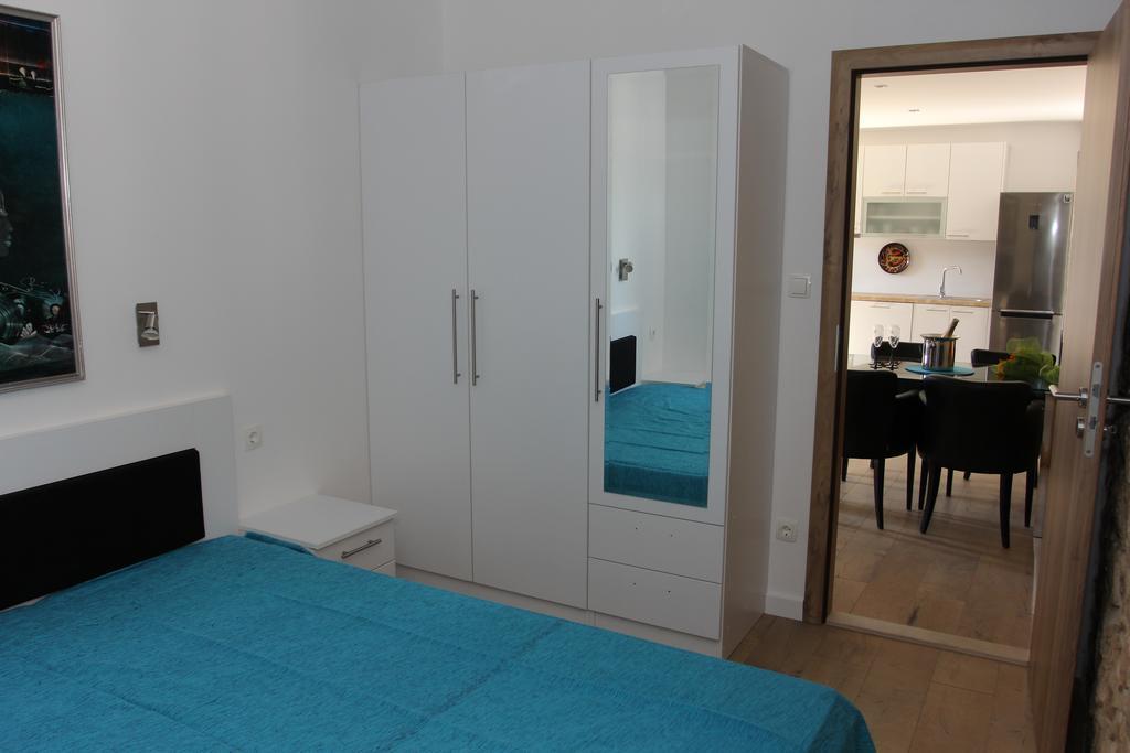 Apartment House Vitaic Супетар Стая снимка